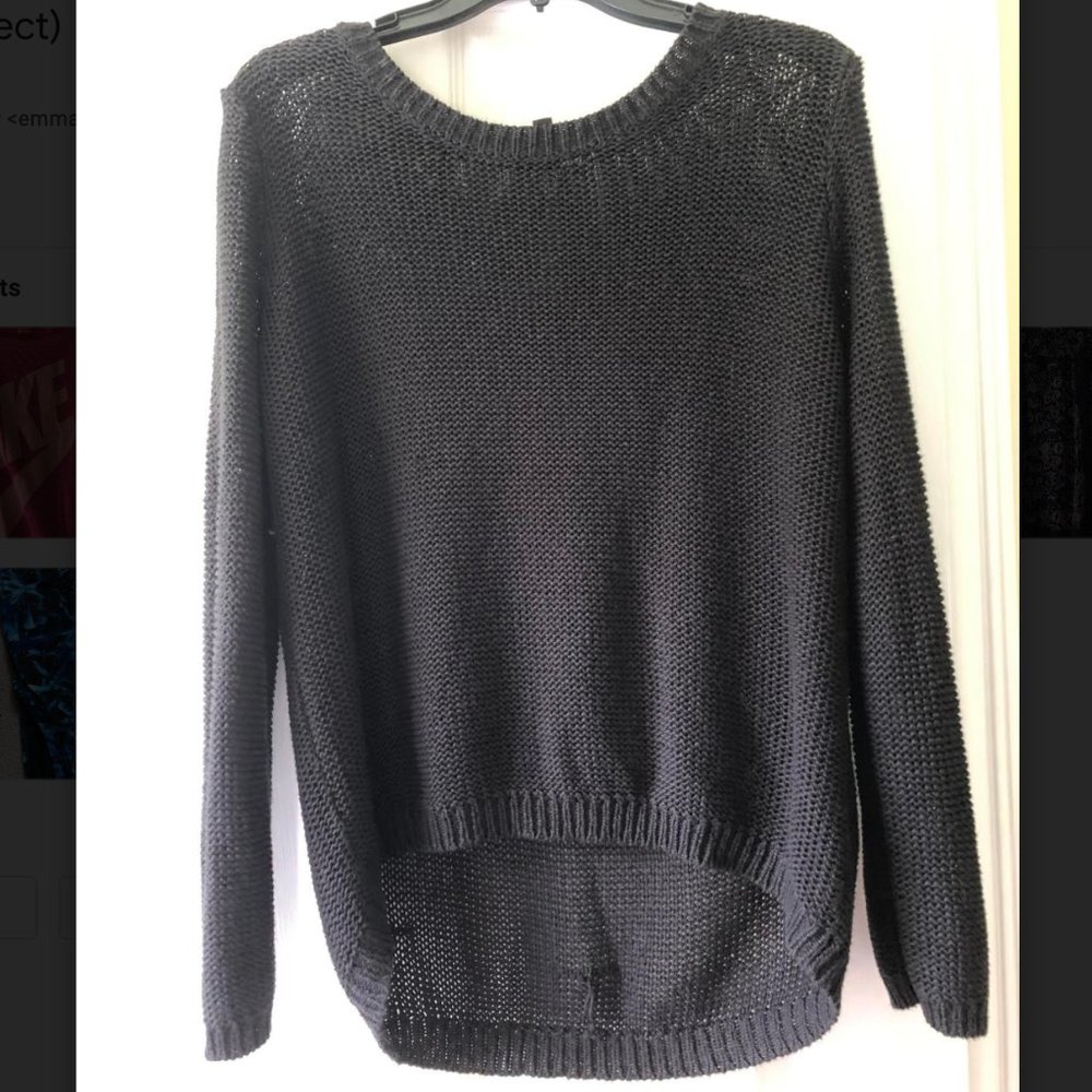 Divided black sweater